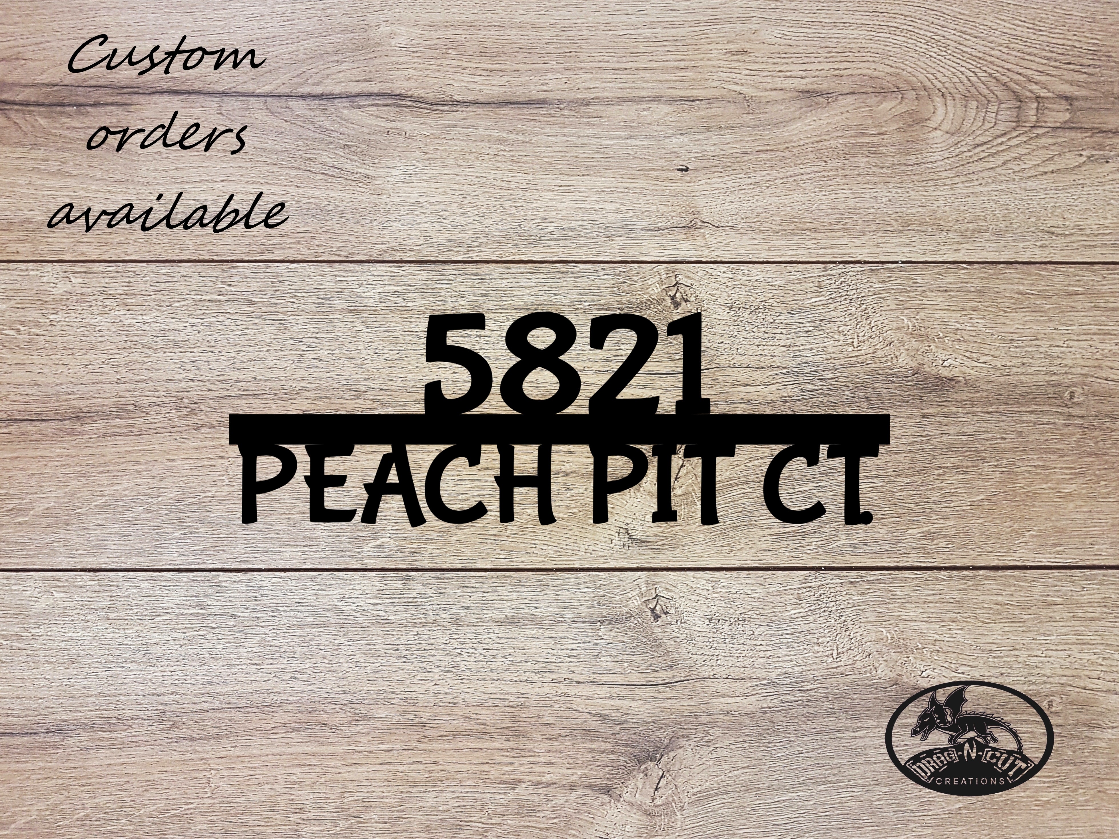 Black durable powder coated outdoor house number address sign.